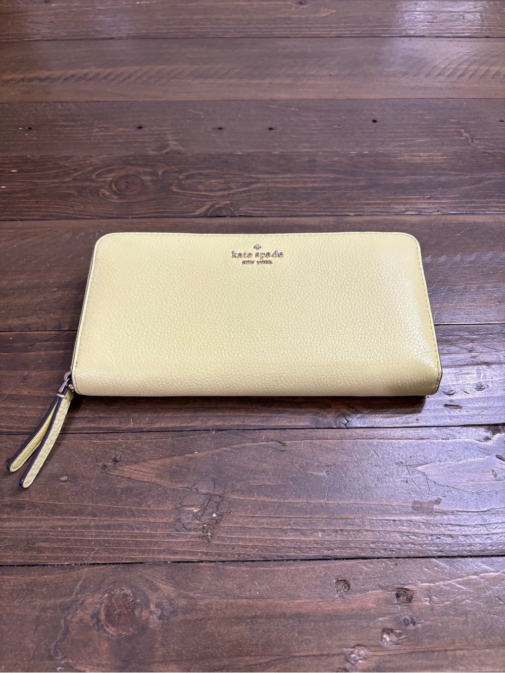 Kate Spade Zip-Around Continental Wallet in Pale Yellow